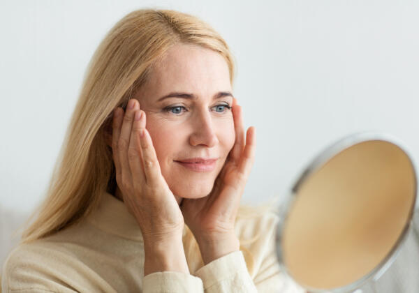 Perfect Skin. Middle-aged Woman Satisfied With Her Skin